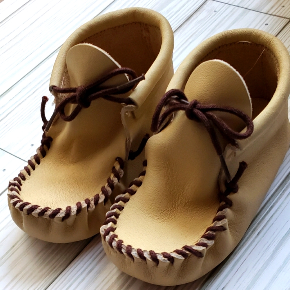 Chequamegon Moccasin baby size 5. Brand new with box.